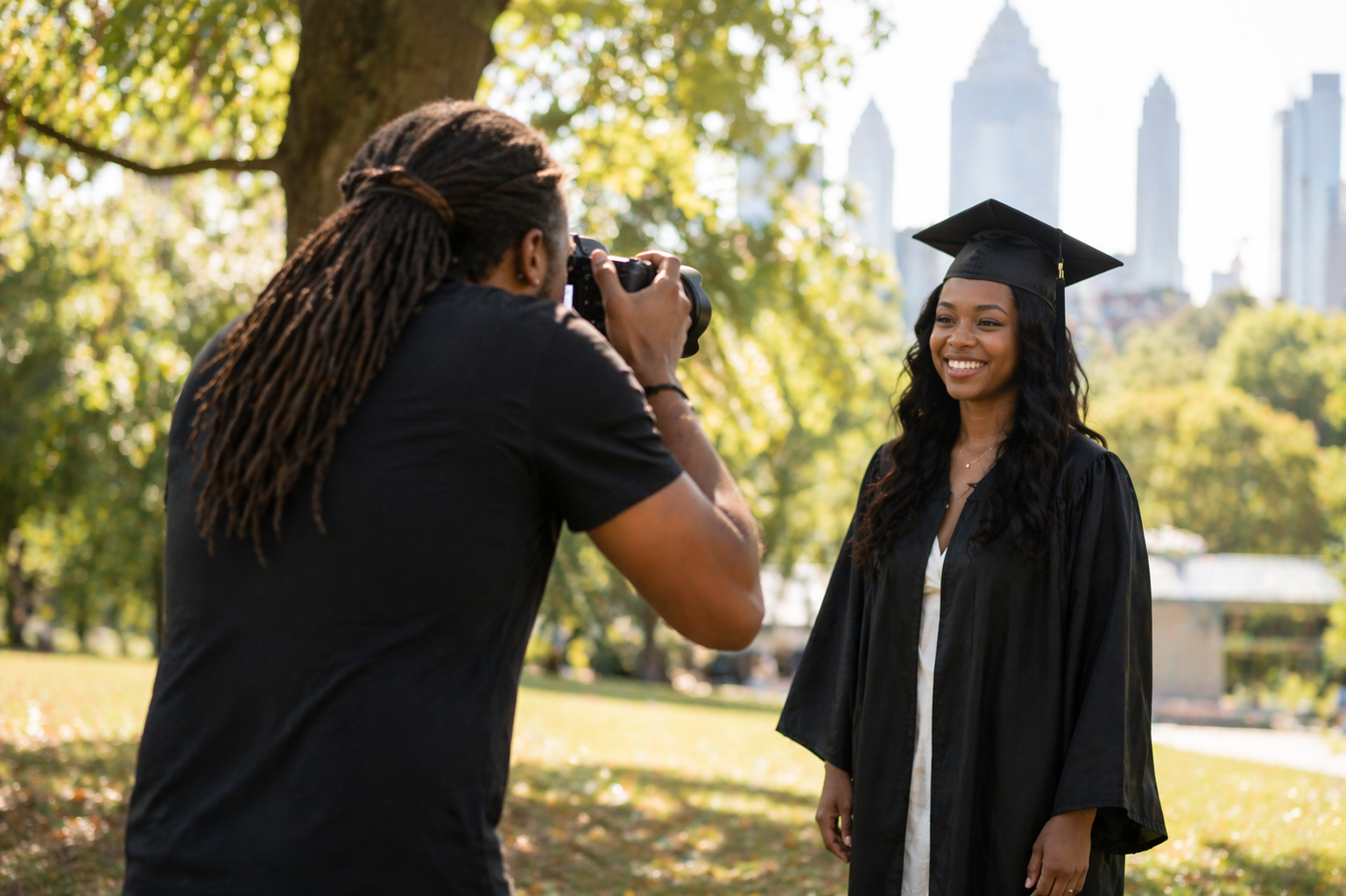 Photographer guiding a graduate through a relaxed outdoor session in Atlanta, Georgia for a polished graduation portrait experience