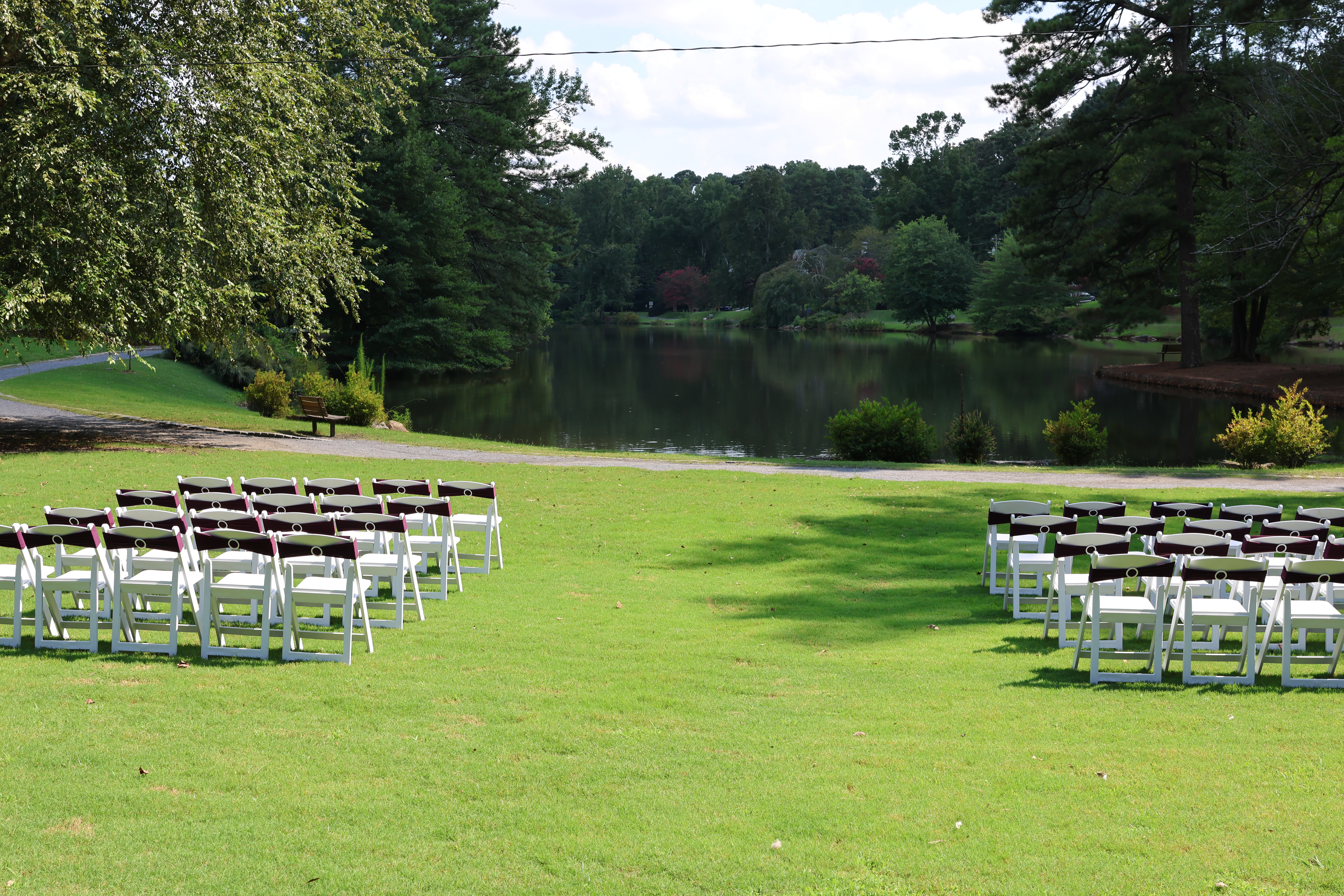 Outdoor lakeside wedding ceremony venue photographed by Media Circle in Snellville, GA
